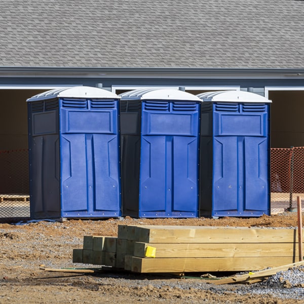 what is the cost difference between standard and deluxe portable toilet rentals in Mexia Alabama